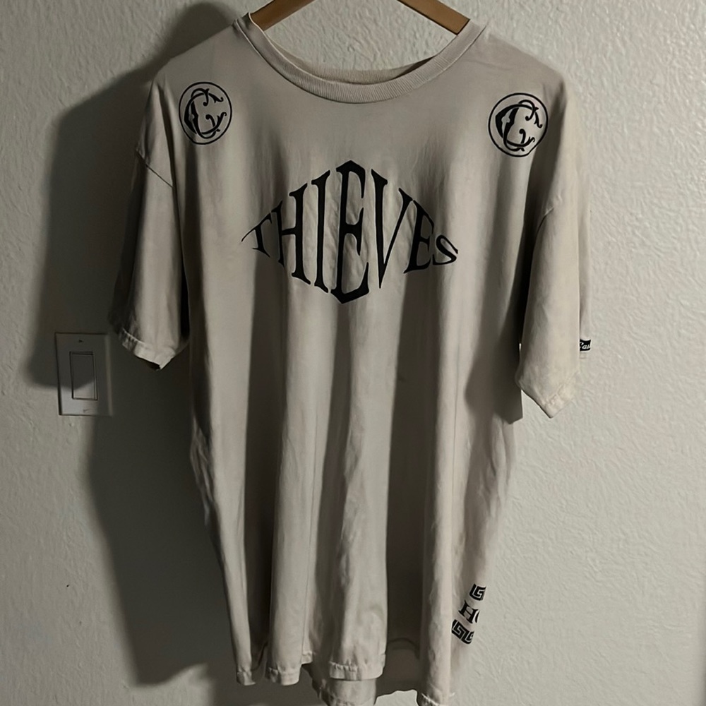 Mens large graphic tee. Light tan color. Crooks & Castles brand.
